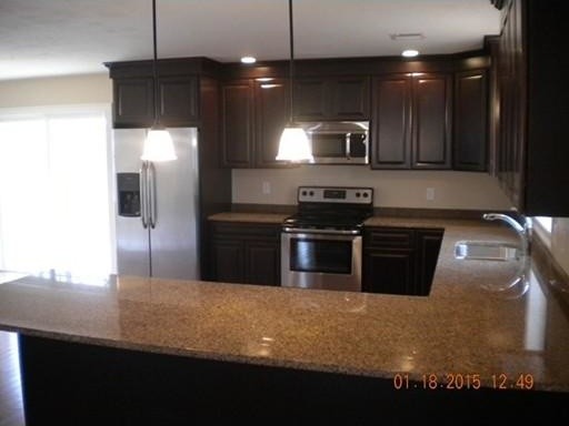 Photo of a modern kitchen in Boston.