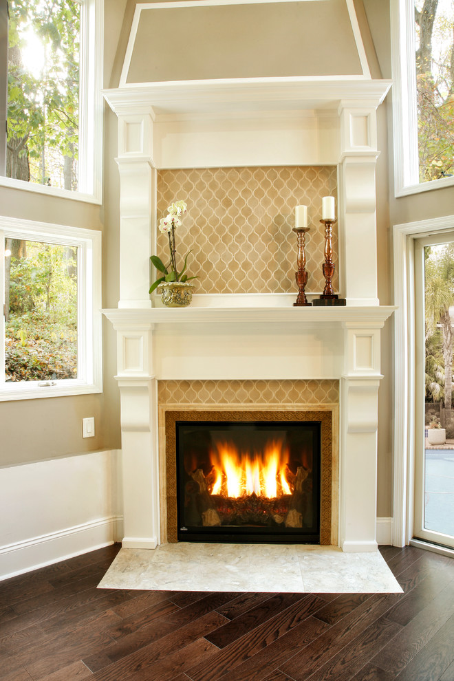 Fireplace in a room with very high ceilings Traditional Living Room New York by Ember