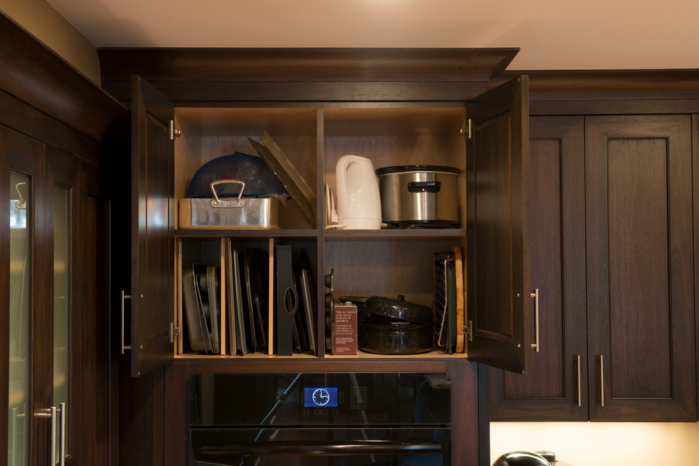Example of a transitional home design design in Vancouver