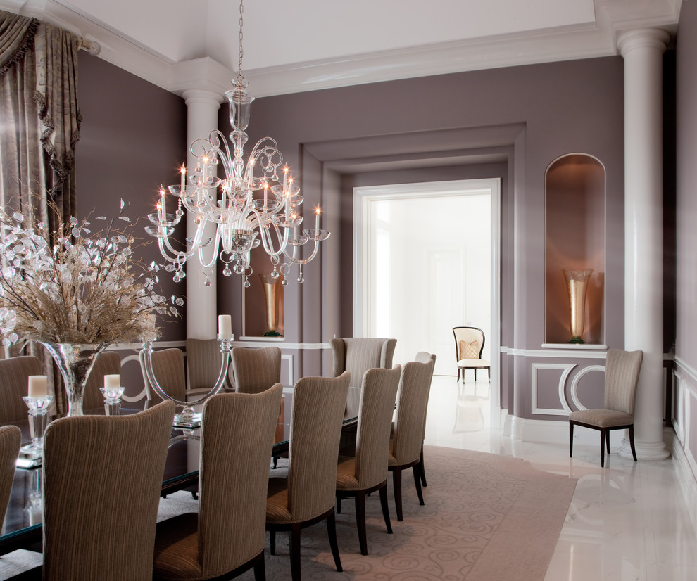 Large traditional separate dining room in Chicago with purple walls, marble floors, no fireplace and white floor.
