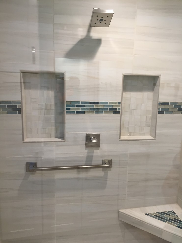 Mid-sized transitional gray tile and porcelain tile ceramic tile and gray floor walk-in shower photo in Phoenix with shaker cabinets, white cabinets, blue walls, an undermount sink, granite countertops and a hinged shower door