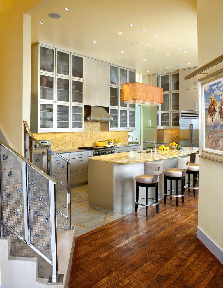Inspiration for a large contemporary galley eat-in kitchen in Dallas with flat-panel cabinets, stainless steel appliances, a double-bowl sink, grey cabinets, solid surface benchtops, yellow splashback, mosaic tile splashback, slate floors, with island and yellow benchtop.