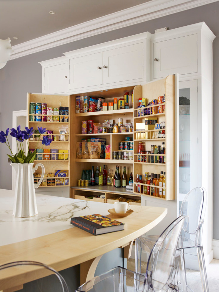 Design ideas for a transitional kitchen pantry in Other with shaker cabinets, white cabinets and with island.