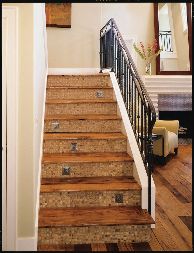 Photo of a small mediterranean wood l-shaped staircase in San Francisco with wood risers.