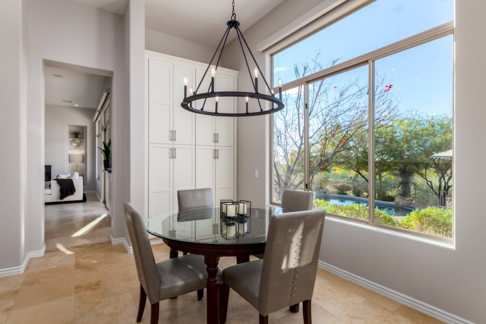 Large transitional u-shaped travertine floor and beige floor kitchen/dining room combo photo in Phoenix with a farmhouse sink, shaker cabinets, white cabinets, quartz countertops, gray backsplash, ceramic backsplash, stainless steel appliances, an island and white countertops