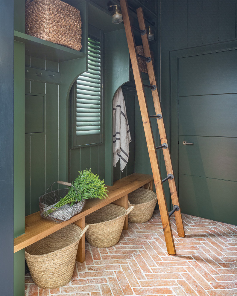 Inspiration for a beach style mudroom in Other.