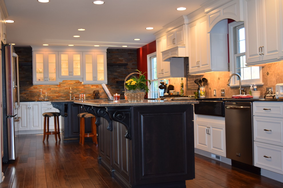 Kitchen - transitional medium tone wood floor kitchen idea with a farmhouse sink, beaded inset cabinets, white cabinets, quartz countertops, beige backsplash, ceramic backsplash, stainless steel appliances and an island