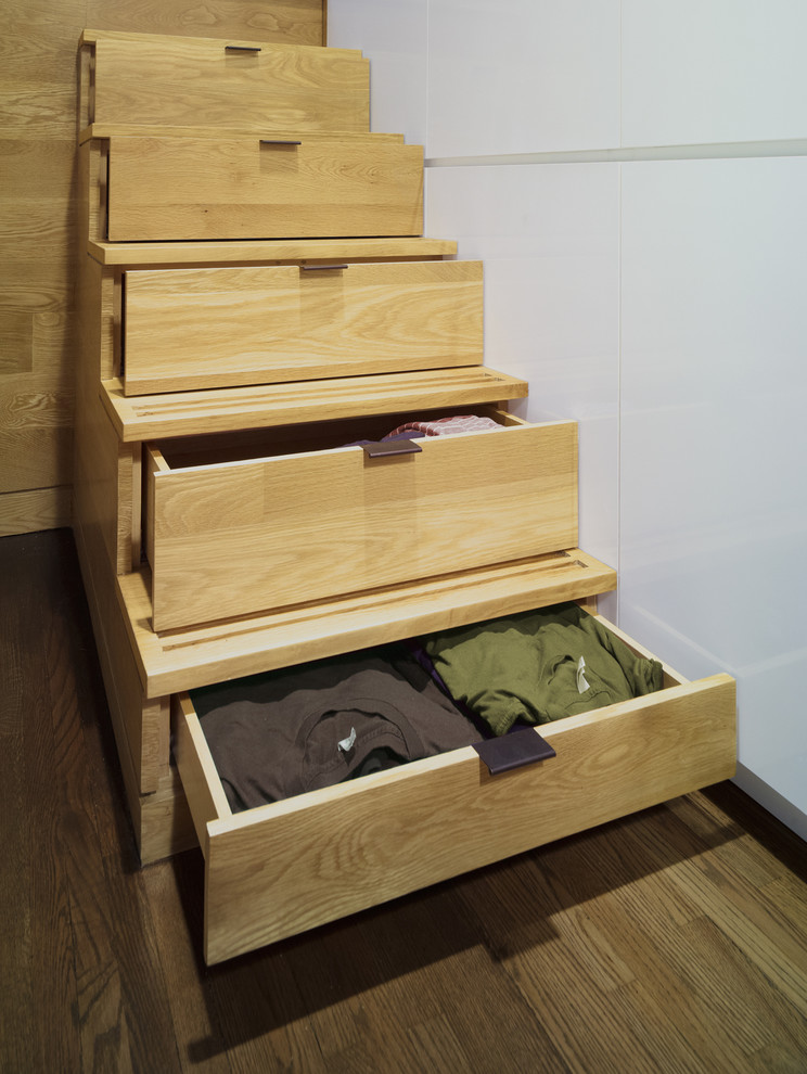 Design ideas for a contemporary wood staircase in New York with wood risers.