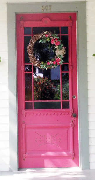 Eastlake entry door with colored glass panes Eastlake entry door with colored glass panes