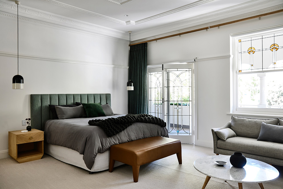 Inspiration for a transitional master bedroom in Melbourne with white walls, carpet and white floor.
