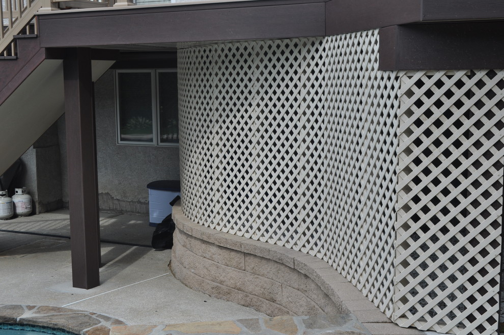 Mid-sized transitional backyard deck photo with no cover