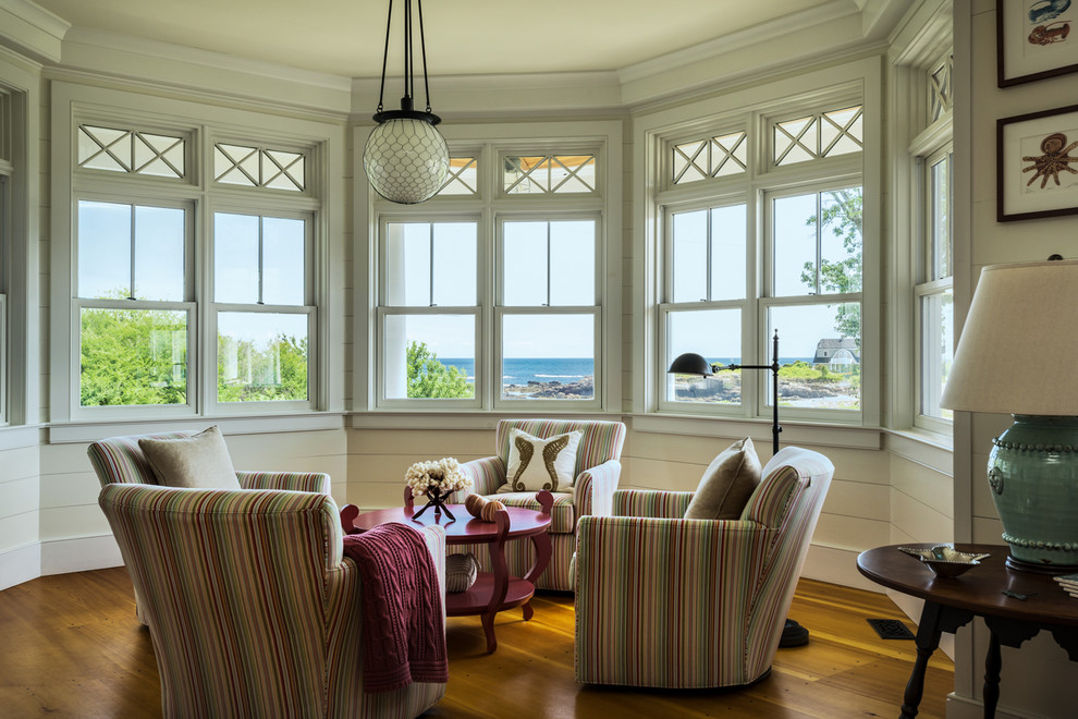 Small beach style formal and enclosed medium tone wood floor and beige floor living room photo in Boston with white walls, no fireplace and no tv