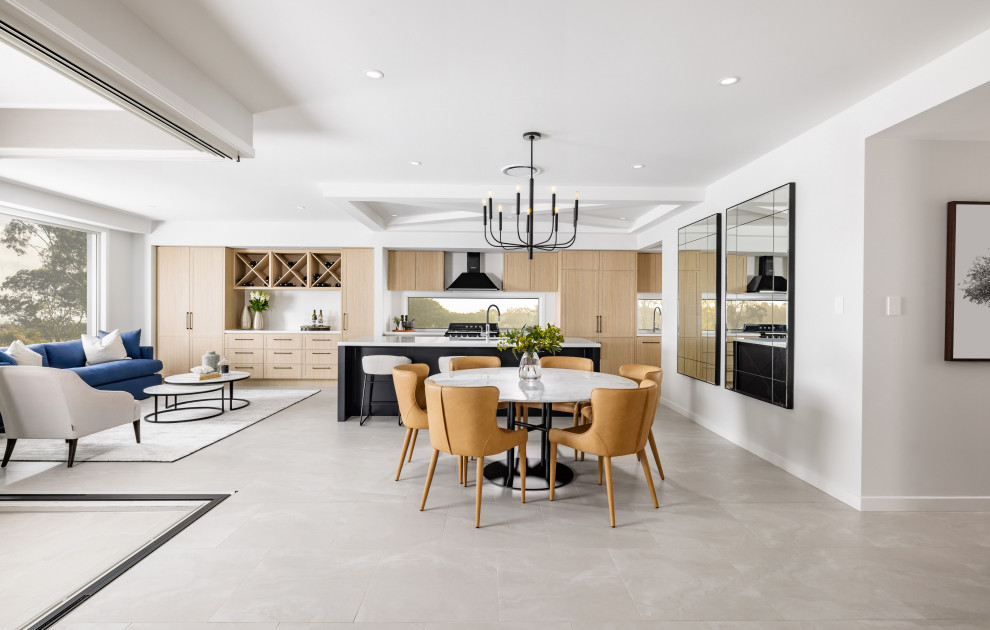 This is an example of a contemporary dining room in Brisbane.