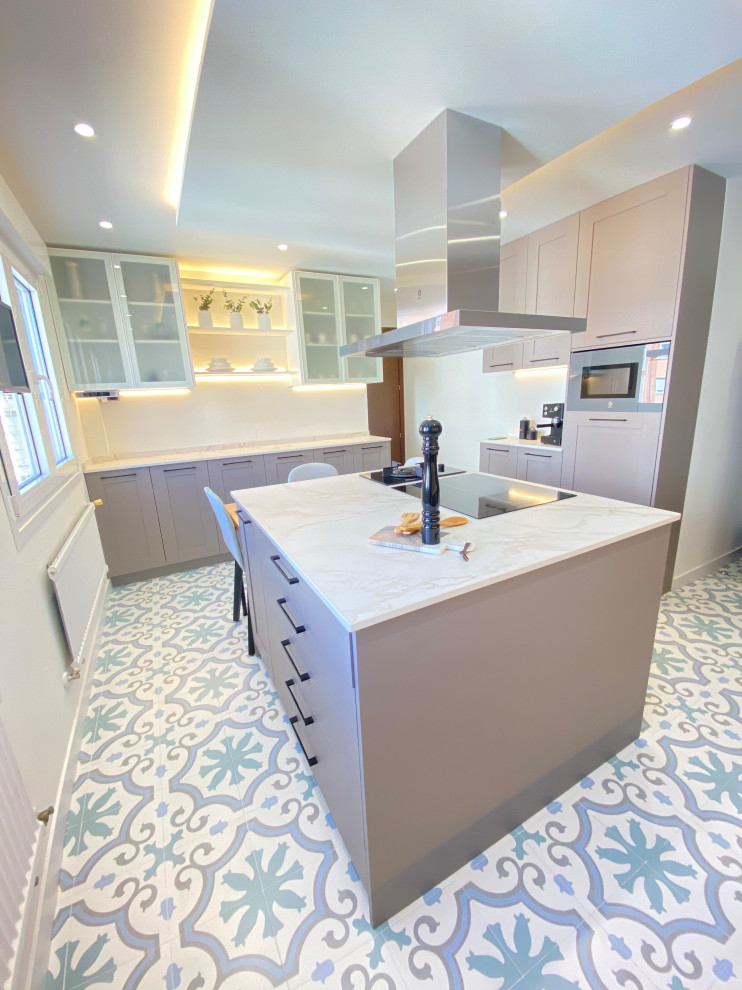 Inspiration for a large transitional u-shaped porcelain tile and multicolored floor enclosed kitchen remodel in Other with an undermount sink, beaded inset cabinets, pink cabinets, marble countertops, white backsplash, marble backsplash, colored appliances, two islands and white countertops
