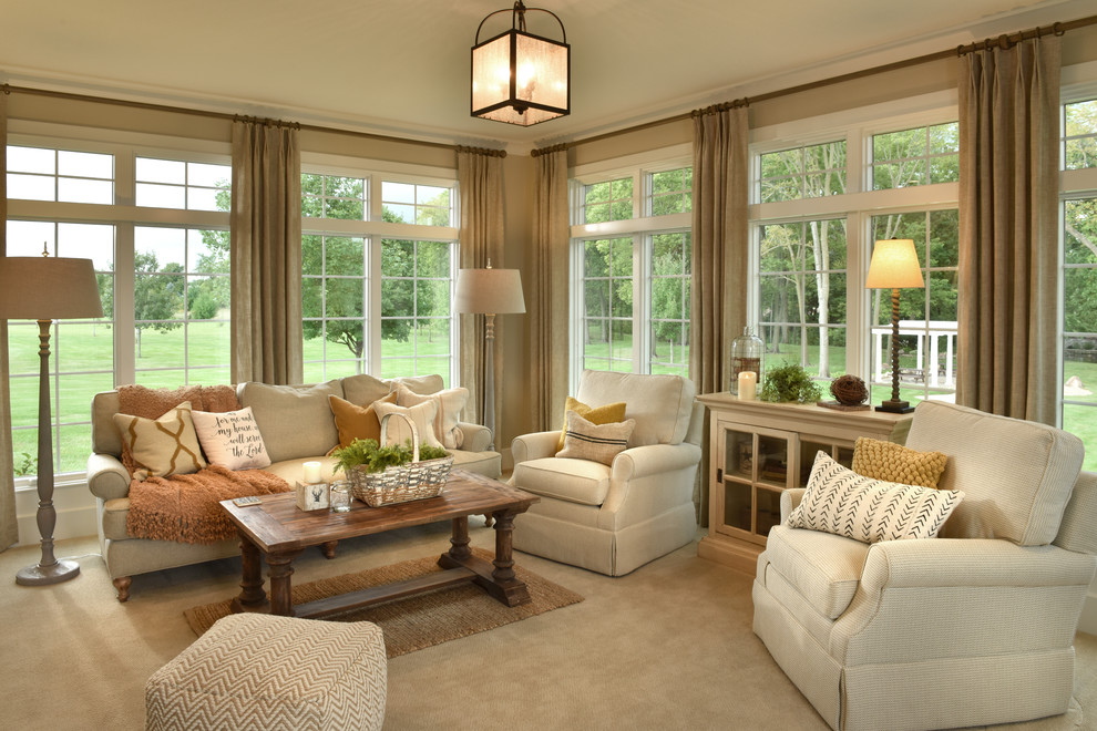 This is an example of a traditional sunroom in Other with carpet, no fireplace and a standard ceiling.
