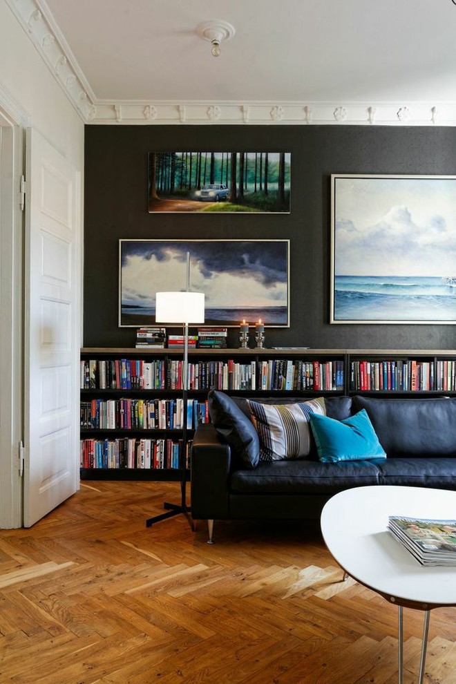 Modern living room in Copenhagen with medium hardwood floors and brown floor.