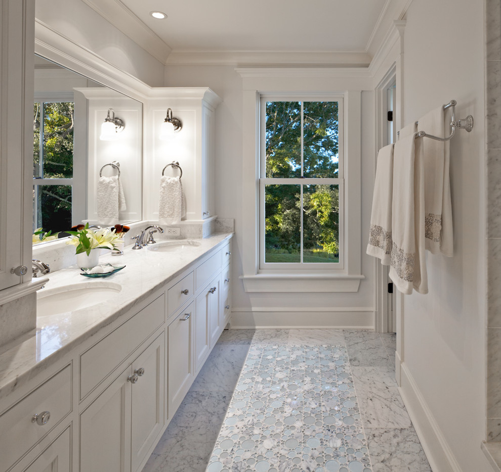 Beach style bathroom in Boston with white cabinets, white walls and recessed-panel cabinets.