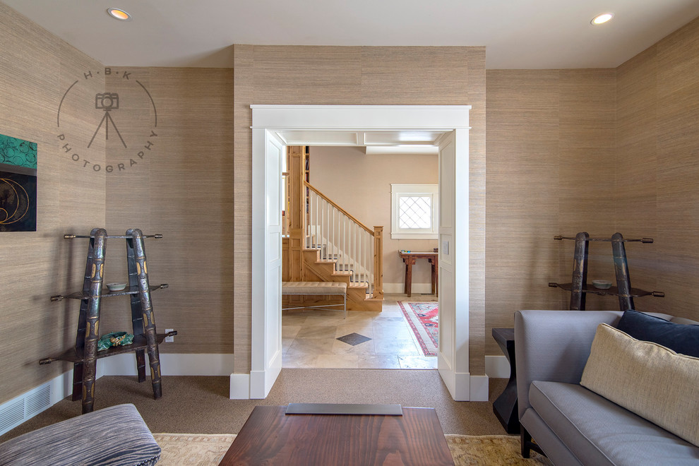 Large porcelain tile and brown floor foyer photo with brown walls