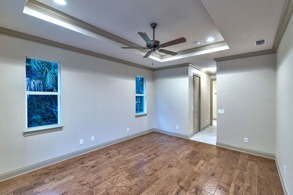Example of a transitional home design design in Miami
