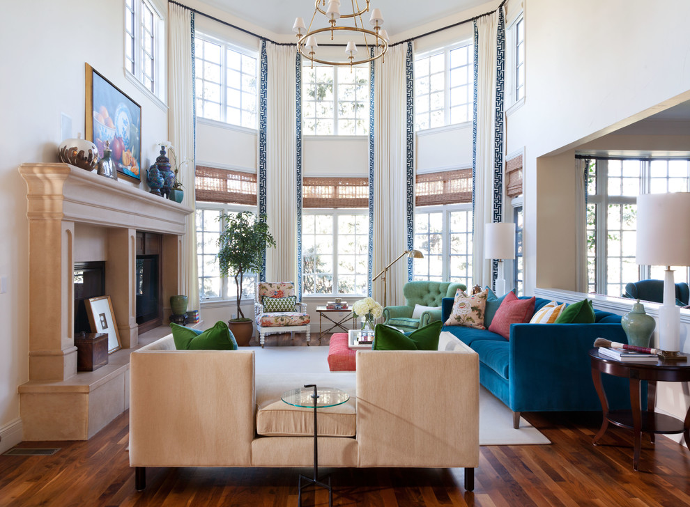 Living room - huge transitional formal and open concept medium tone wood floor and vaulted ceiling living room idea in Denver with a standard fireplace and a stone fireplace