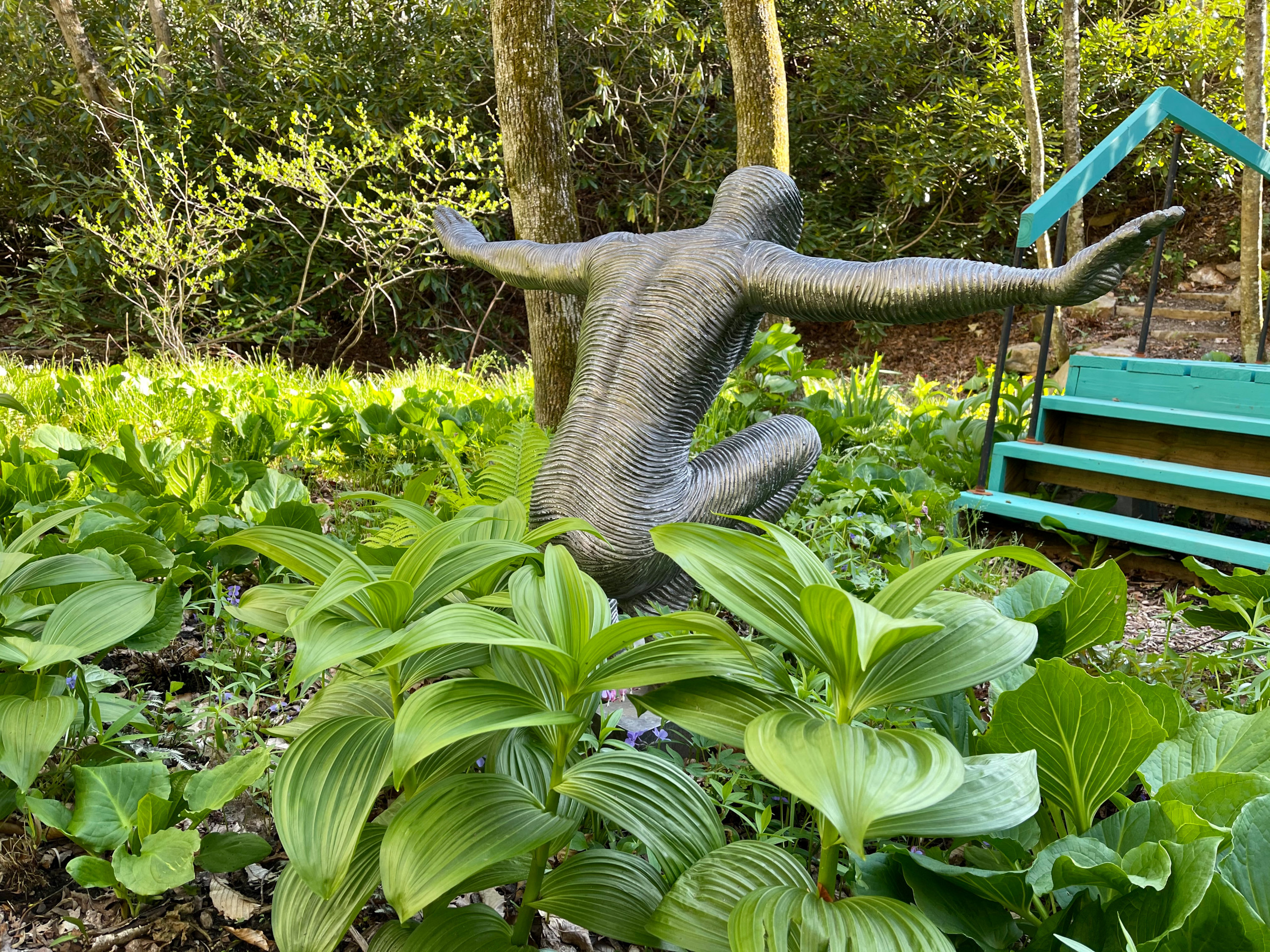 Metal sculpture greets garden visitors