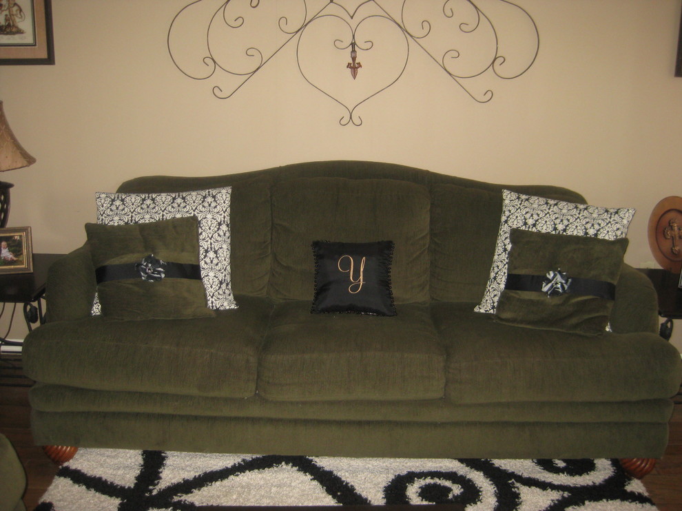 Need help with our living room redesign around ugly couches!