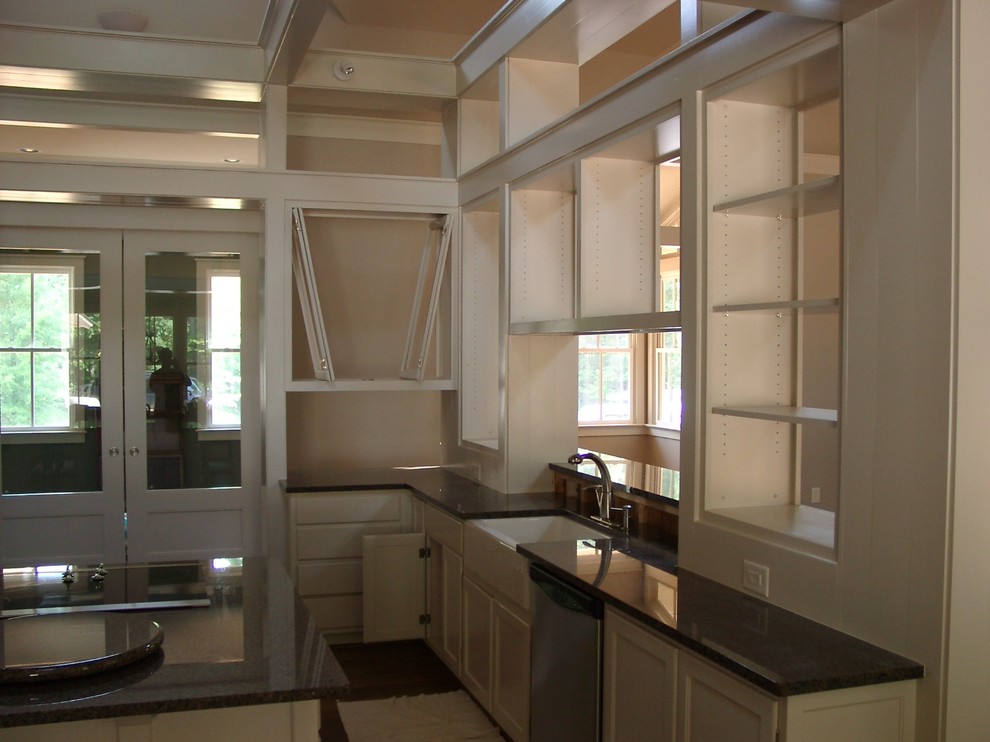 Design ideas for a large arts and crafts galley eat-in kitchen in Raleigh with an undermount sink, flat-panel cabinets, white cabinets, granite benchtops, multi-coloured splashback, stainless steel appliances, dark hardwood floors and with island.