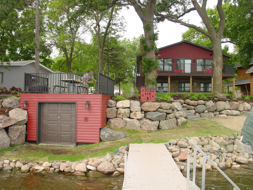 Small traditional detached one-car boathouse in Minneapolis.