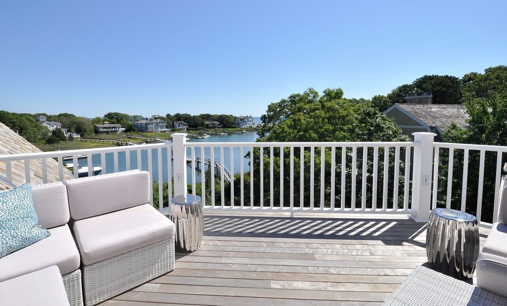 This is an example of a beach style deck in Boston.