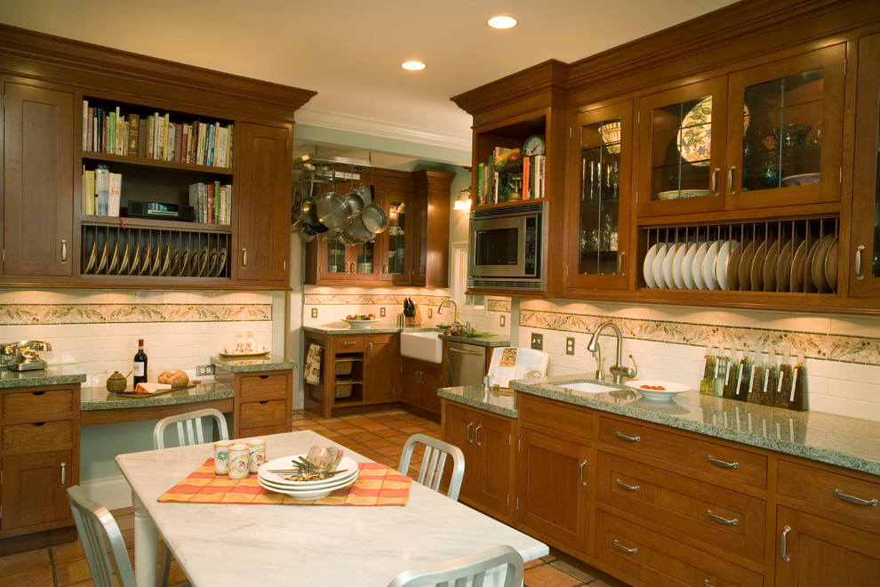 This is an example of a traditional kitchen in Portland with granite benchtops.