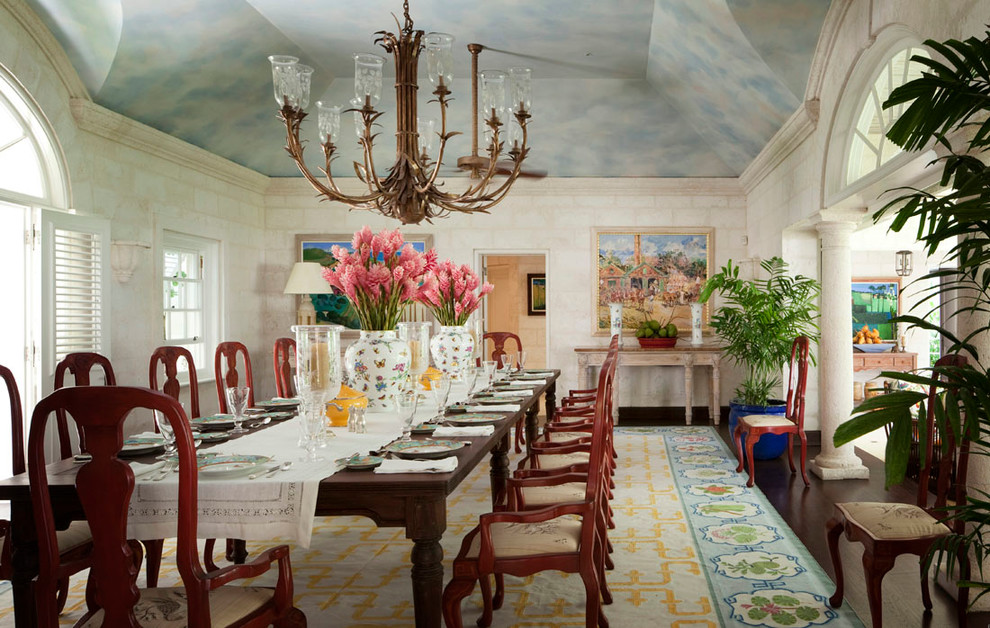 Traditional dining room in New York with white walls and dark hardwood floors.