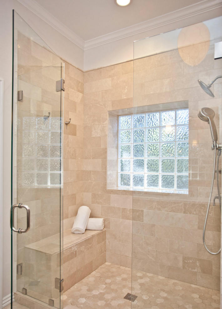 Alcove shower - large transitional master ceramic tile and beige floor alcove shower idea with recessed-panel cabinets, brown cabinets, a one-piece toilet, white walls, an undermount sink, quartzite countertops and a hinged shower door