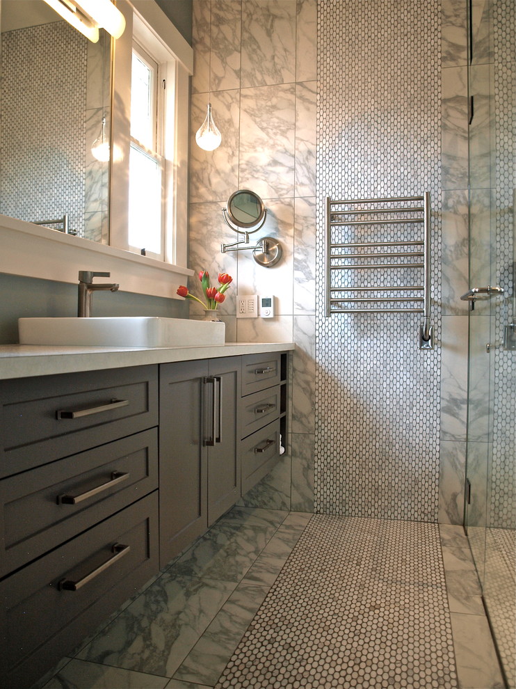 Design ideas for a mid-sized contemporary bathroom in Vancouver with a vessel sink, shaker cabinets, grey cabinets, engineered quartz benchtops, an open shower, a two-piece toilet, white tile, stone tile, grey walls and marble floors.