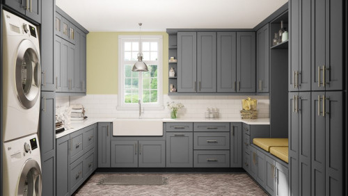 Modern laundry room with grey RTA kitchen cabinets, farmhouse sink, and full storage system