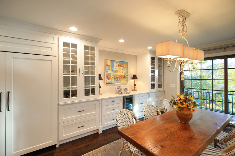 Large transitional galley dark wood floor eat-in kitchen photo in Chicago with a farmhouse sink, flat-panel cabinets, white backsplash, marble backsplash and stainless steel appliances
