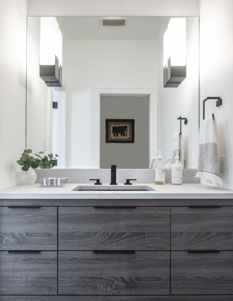 Inspiration for a modern single-sink bathroom remodel in Baltimore with flat-panel cabinets, gray cabinets, a built-in vanity, white walls, an undermount sink and white countertops