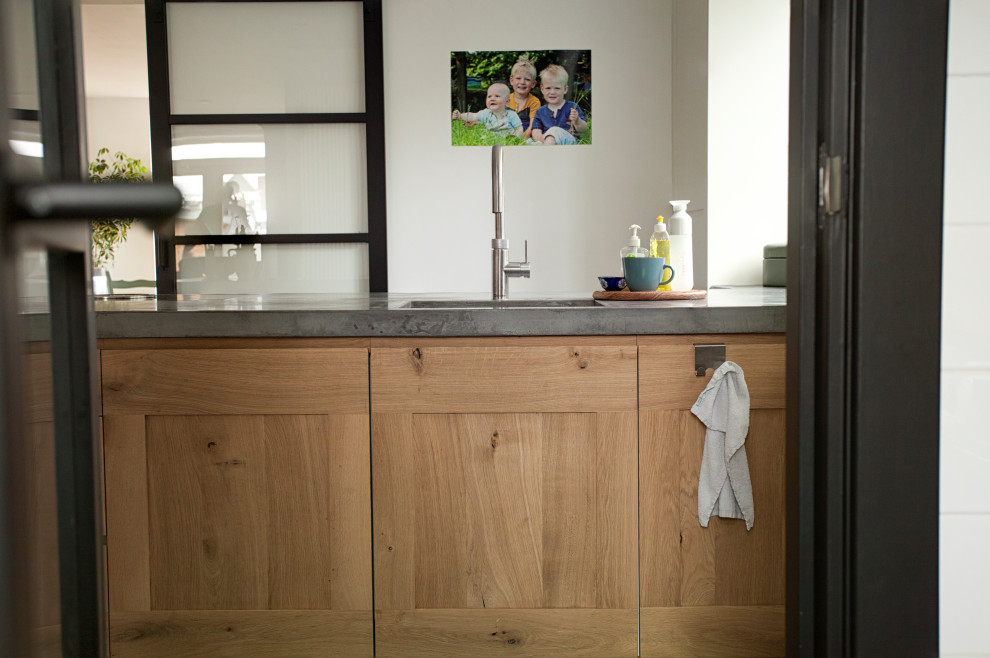 Inspiration for a rustic kitchen remodel in Amsterdam