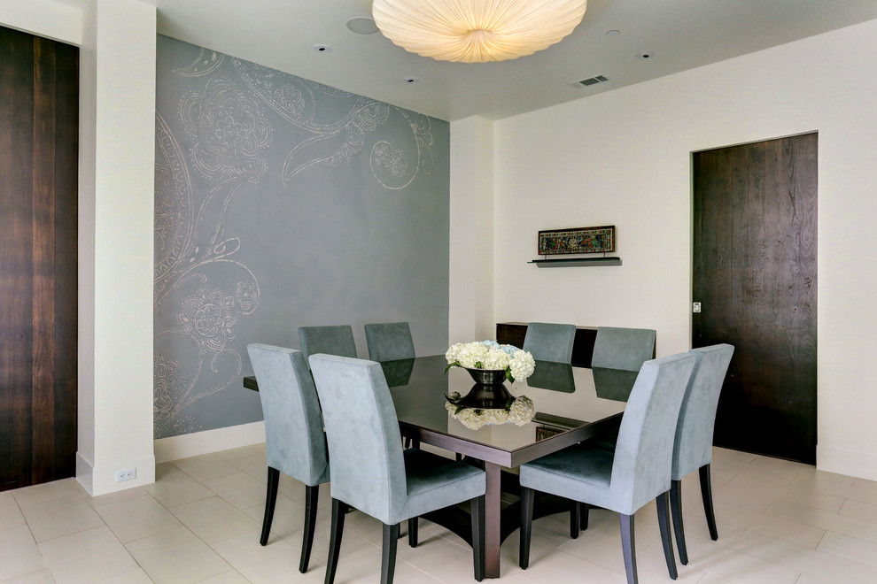 Design ideas for a transitional dining room in Houston with multi-coloured walls, porcelain floors and no fireplace.
