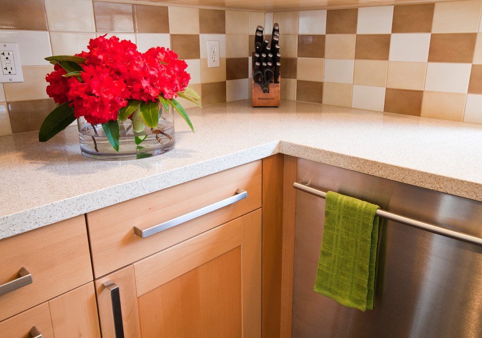 Example of a transitional kitchen design in Seattle