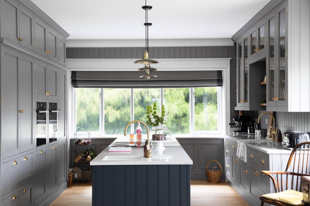 Inspiration for a mid-sized country galley open plan kitchen in Other with with island.