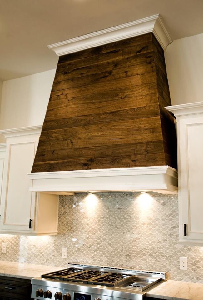 Open concept kitchen - large transitional l-shaped dark wood floor open concept kitchen idea in Austin with recessed-panel cabinets, white cabinets, marble countertops, gray backsplash, marble backsplash, stainless steel appliances, an undermount sink and an island