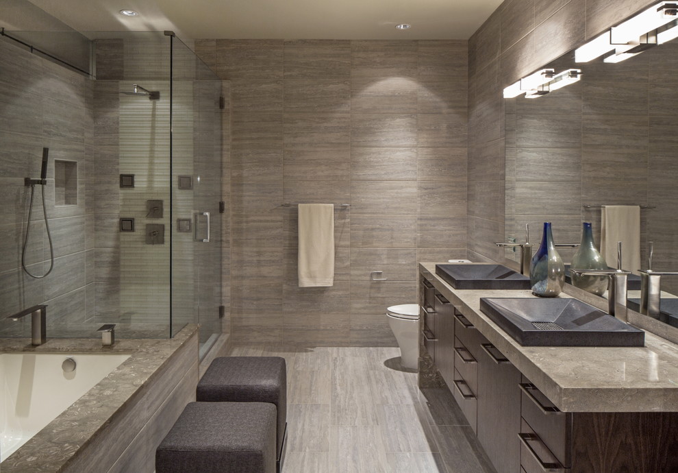Inspiration for a contemporary bathroom in Omaha with a vessel sink.
