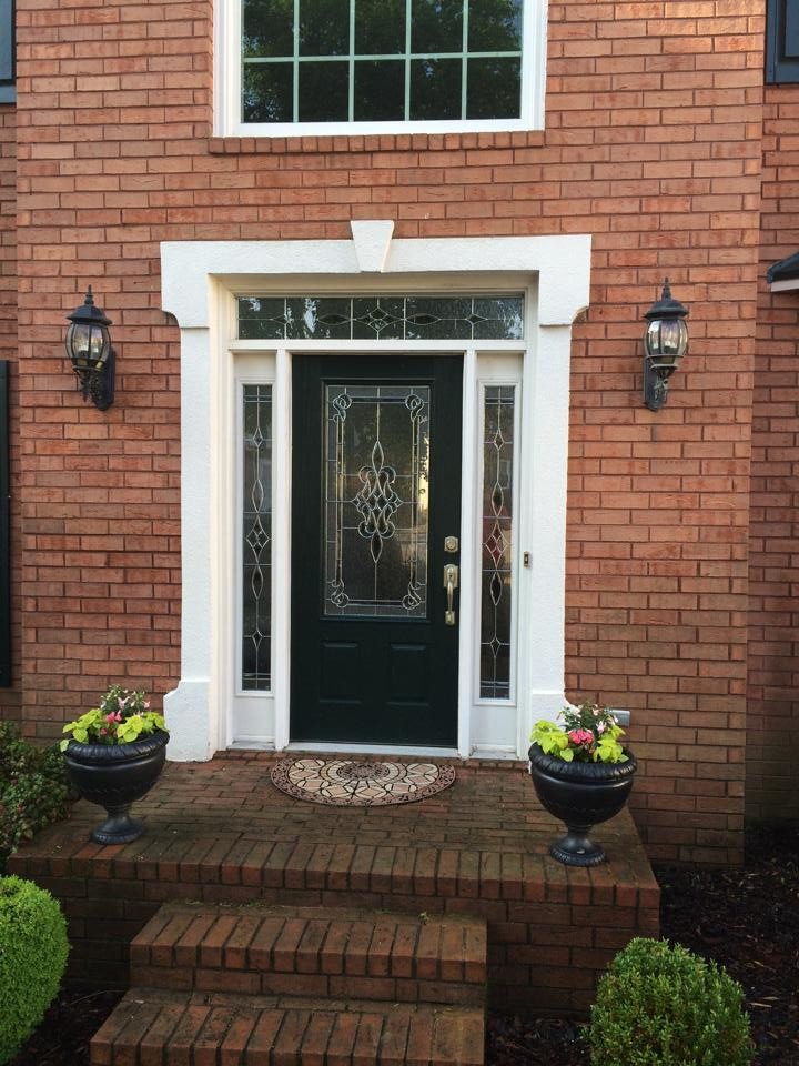 Front door - large transitional front door idea in Atlanta with a black front door