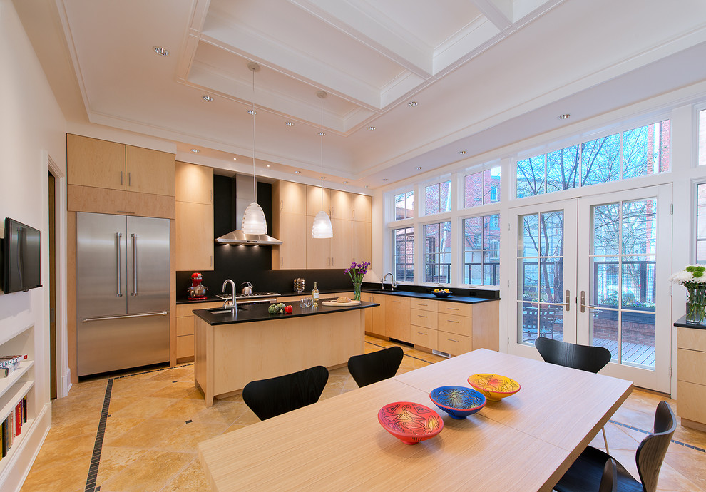 Large contemporary l-shaped eat-in kitchen in DC Metro with an undermount sink, flat-panel cabinets, light wood cabinets, granite benchtops, black splashback, stone slab splashback, stainless steel appliances, linoleum floors and with island.