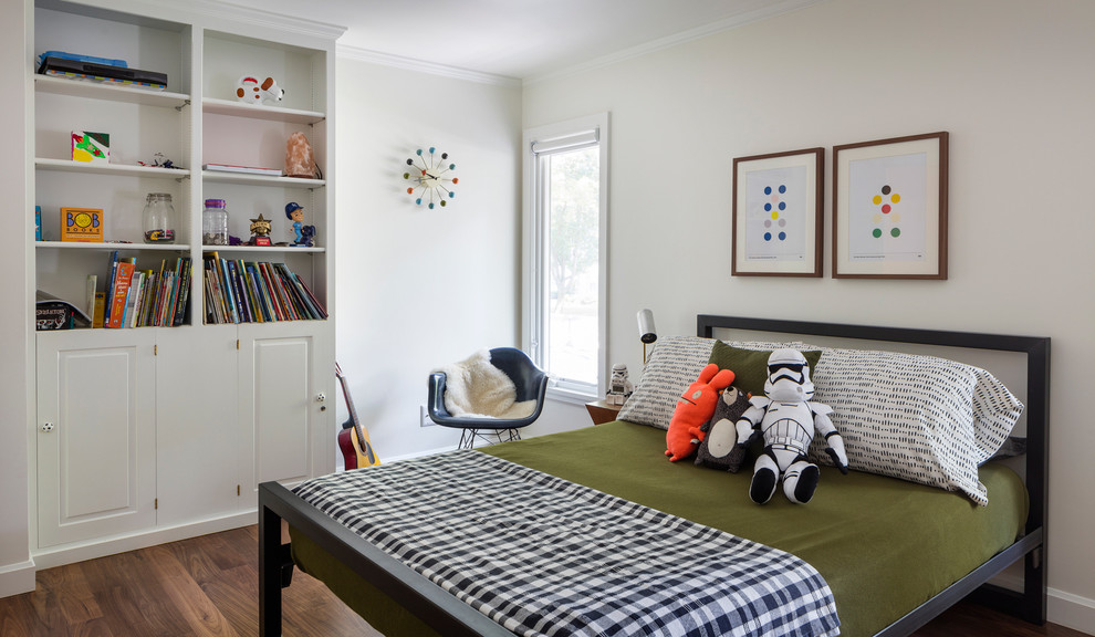 Large trendy boy dark wood floor kids' bedroom photo in Kansas City with white walls