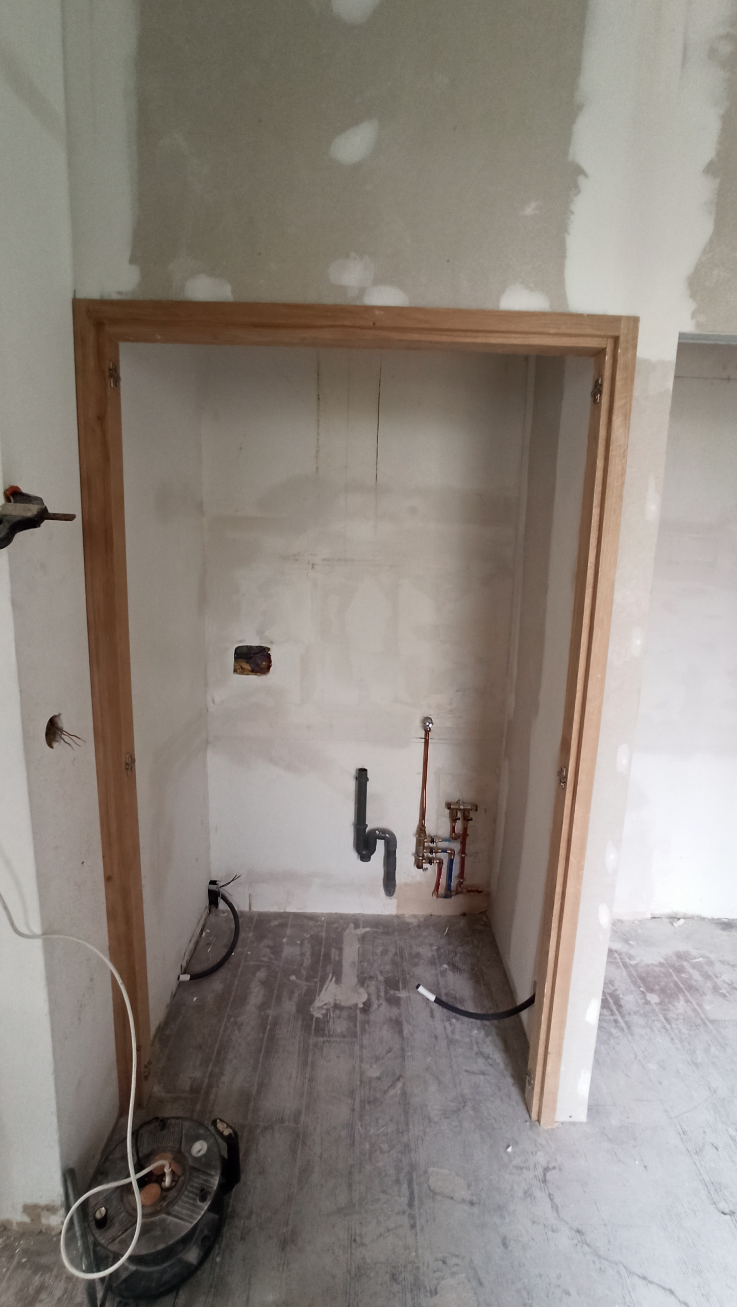 Transformation d'une chambre parentale en pièce de vie/cuisine