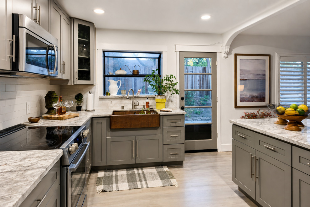 AFTER: COPPER SINK, SUBWAY TILE & GRAY CABINETRY