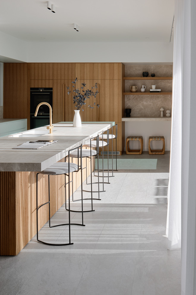 This is an example of a mid-sized contemporary kitchen in Brisbane.