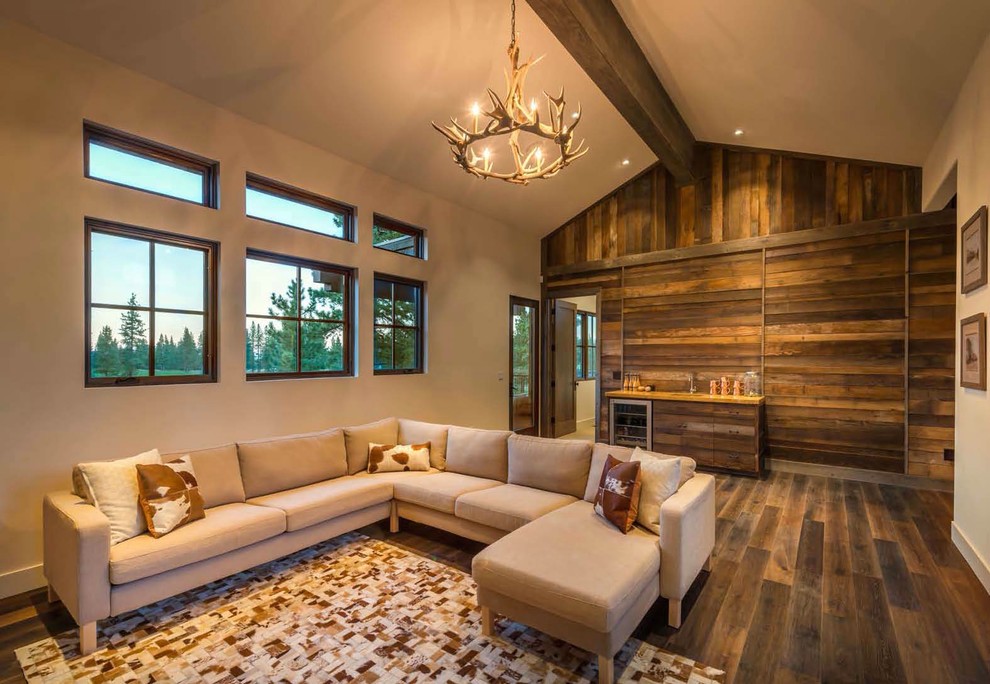 Country living room in Sacramento with beige walls and dark hardwood floors.