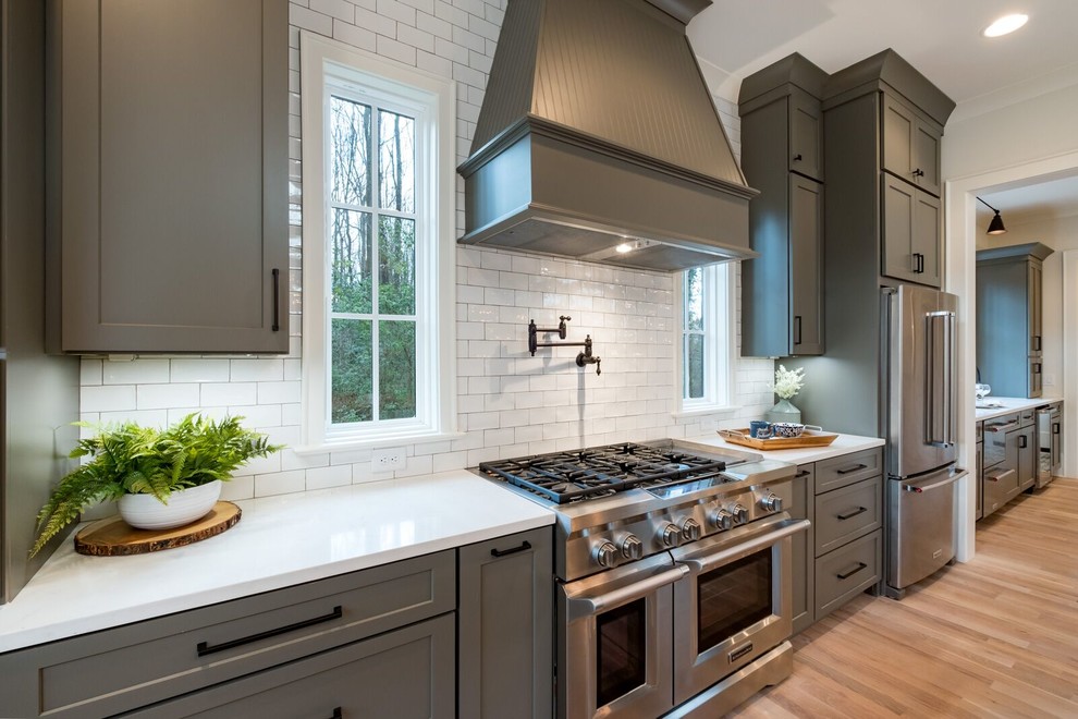Example of a farmhouse kitchen design in Charlotte